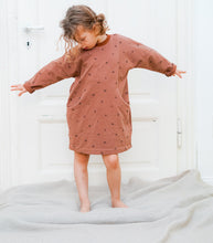Sewing pattern for an oversized kids dress up to 10 years