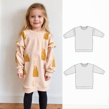 a child wearing a sweatshirt dress