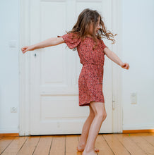 Easy sewing pattern for children featuring the Elastic Neck Jumpsuit