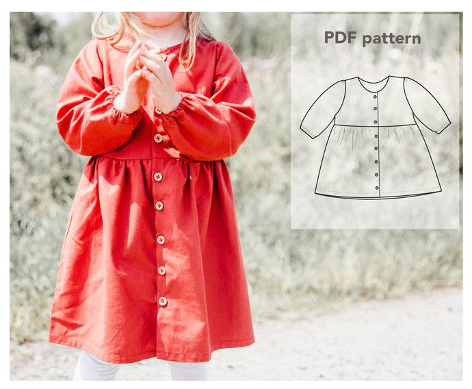 Sewing pattern for a children's dress with buttons 